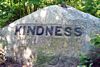 Boulder commissioned by Babson reading "KINDNESS"